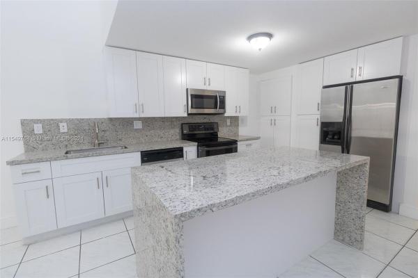 Maria Luisa Estates, 8956 NW 117th Ter, Hialeah Gardens, Florida 33018, image 1