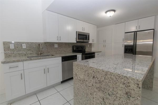 Maria Luisa Estates, 8956 NW 117th Ter, Hialeah Gardens, Florida 33018, image 2