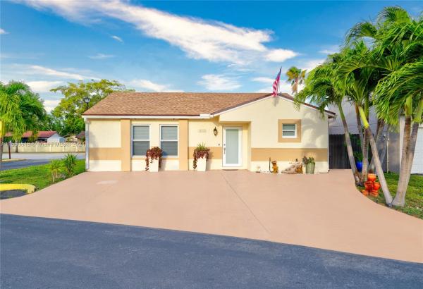 Country Lake Homes, 19909 NW 67th Ct, Country Club, Florida 33015, image 1