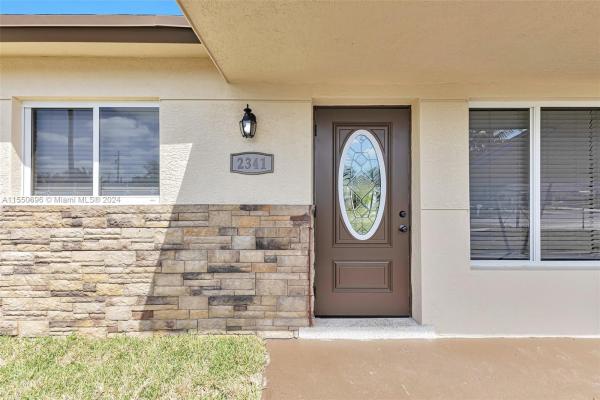 Esquire Lake Estates, 2341 NW 11th Ct, Pompano Beach, Florida 33069, image 1