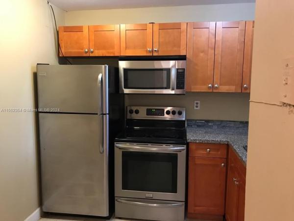 Montecarlo, 482 NW 165th Street Rd #A204, Golden Glades, Florida 33169, image 1