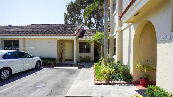 Villa Homes At The Moors, 6194 NW 170th Ln #6194, Country Club, Florida 33015, image 1