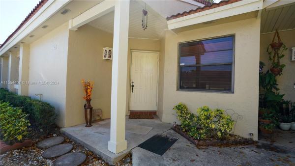Villa Homes At The Moors, 6194 NW 170th Ln #6194, Country Club, Florida 33015, image 2