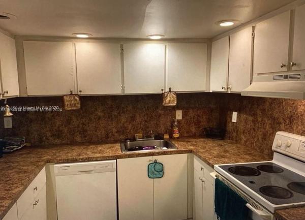 Dennis Townhouses, 934 SW 74th Ave 0, North Lauderdale, Florida 33068, image 1