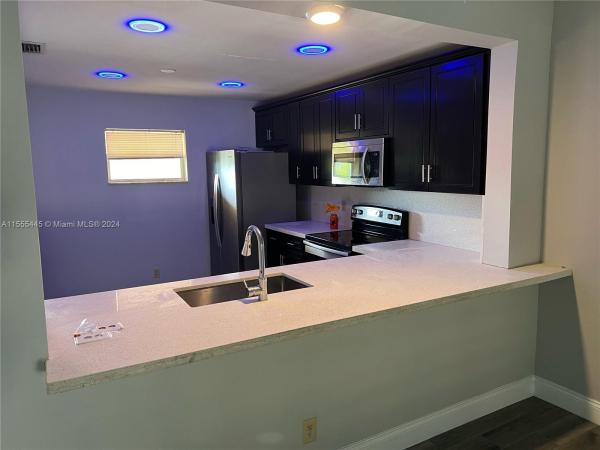 Azalea Court At Woodmont, 8765 Azalea Ct #202, Tamarac, Florida 33321, image 1