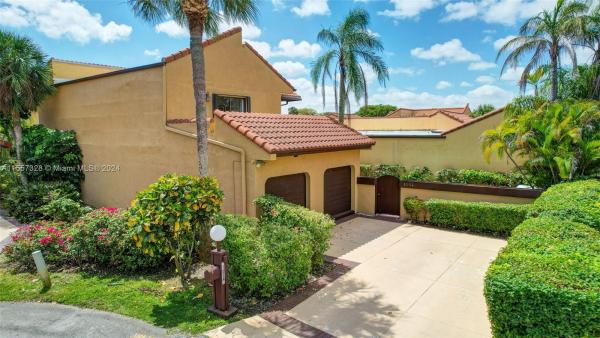 California Club Homes, 1054 NE 203rd Ln, Ives Estates, Florida 33179, image 1