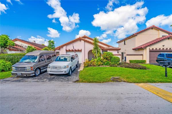 Patio Homes At The Moors, 17522 NW 61st Pl, Country Club, Florida 33015, image 1