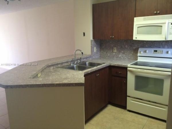 Lakeshore At University Park, 8730 N Sherman Cir #303, Miramar, Florida 33025, image 1