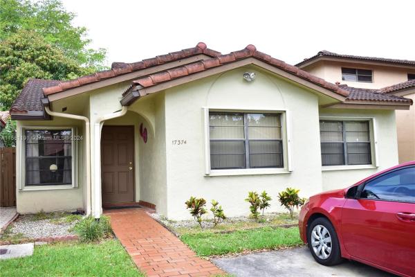 The Moors Townhouses, 17374 NW 66th Pl, Country Club, Florida 33015, image 1