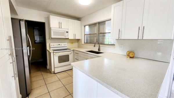 East Gate Estates, 3679 NW 28th Ct, Lauderdale Lakes, Florida 33311, image 1