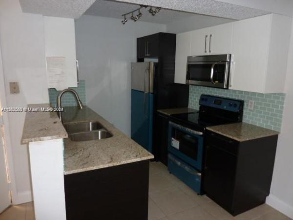 Biscayne Beach Club, 10441 SW 156th Ct #413, The Hammocks, Florida 33196, image 1