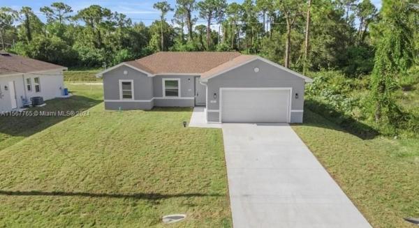 Greenbriar, 1926 Zombar Ct, Lehigh Acres, Florida 33972, image 1