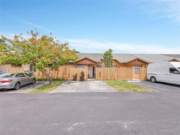 Aspen Townhomes, 6773 NW 186th Ter #6773, Country Club, Florida 33015, image 1