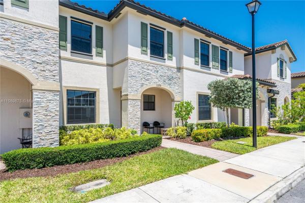Coco Palm Villas At Isola, 11375 SW 250th Ter, South Miami Heights, Florida 33032, image 1