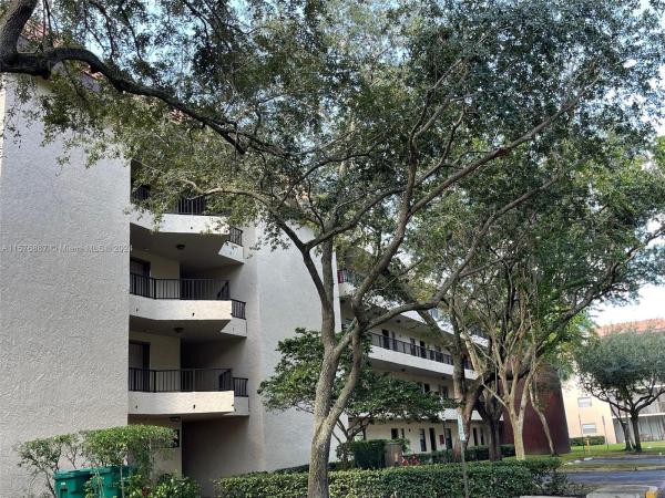Plantation Racquet Club At Jacaranda, 10501 W Broward Blvd #303, Plantation, Florida 33324, image 1