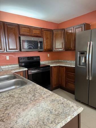 Monterey Village, 447 NE 210th Cir Ter #202-20, Ives Estates, Florida 33179, image 1