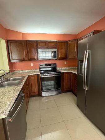 Monterey Village, 447 NE 210th Cir Ter #102-20, Ives Estates, Florida 33179, image 2