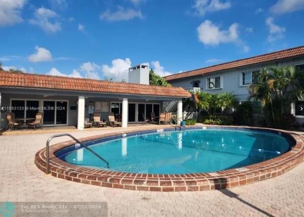 Oakland Grove Village, 649 W Oakland Park Blvd #119A, Oakland Park, Florida 33311, image 1