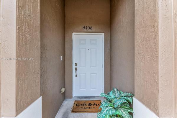 The Woodlands Villas, 4408 Woodland Cir, Tamarac, Florida 33319, image 2