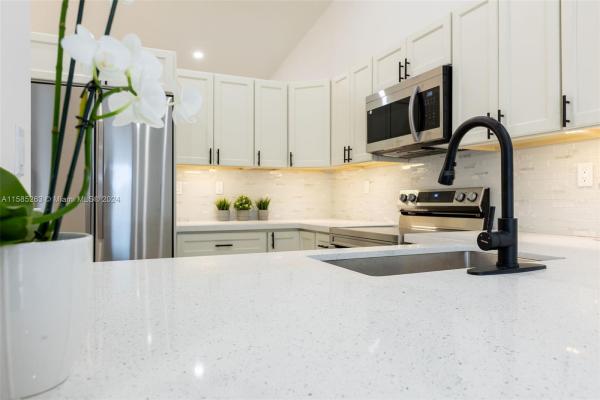 The Moors Townhouses, 17371 NW 66th Pl #17371, Country Club, Florida 33015, image 1