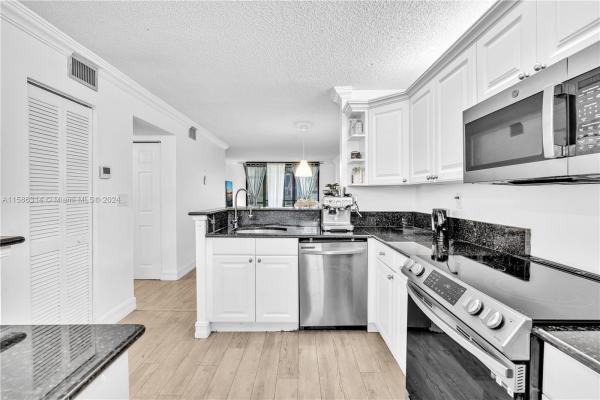Bonaire At Woodmont, 7579 NW 79th Ave #104, Tamarac, Florida 33321, image 1