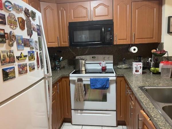 Las Brisas Country Club Of Miami, 7035 NW 186th St #D309, Country Club, Florida 33015, image 2