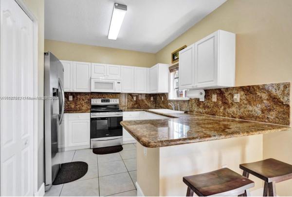 Precious Homes At Twin Lakes, 14333 SW 136th Ct, Three Lakes, Florida 33186, image 3