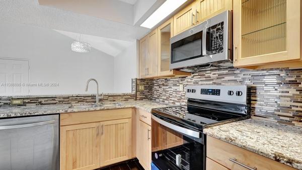 Villa Rustica, 18870 NW 57th Ave #303, Country Club, Florida 33015, image 3
