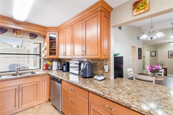 Villa Homes At The Moors, 6554 NW 172nd Ln, Country Club, Florida 33015, image 2