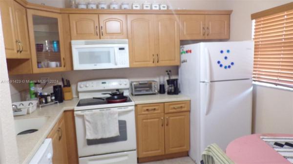 The Greens Of Tamarac, 8856 W Mcnab Rd #104, Tamarac, Florida 33321, image 1