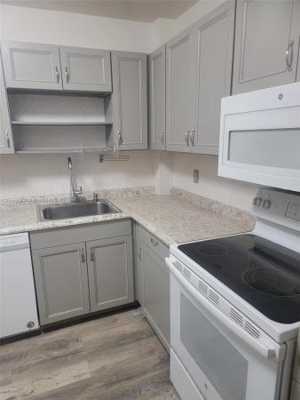 Cambridge House Of Carriage Hills, 300 Berkley Rd #304, Hollywood, Florida 33024, image 1