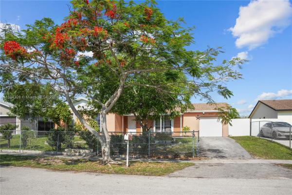 Meadow Wood Manor, 26722 SW 122nd Ct, Three Lakes, Florida 33032, image 1
