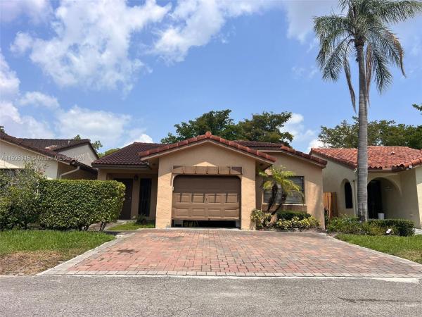 The Moors Townhouses, 17524 NW 66th Pl, Hialeah, Florida 33015, image 1