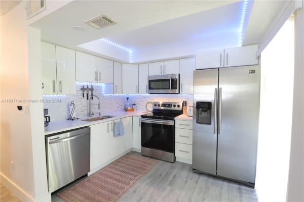 Quatraine, 20210 NE 3rd Ct #1, Ives Estates, Florida 33179, image 1