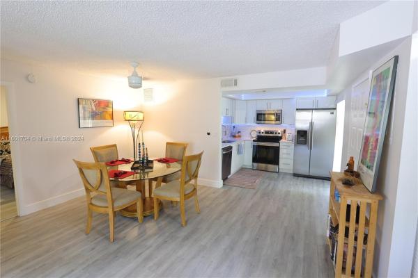 Quatraine, 20210 NE 3rd Ct #1, Ives Estates, Florida 33179, image 2