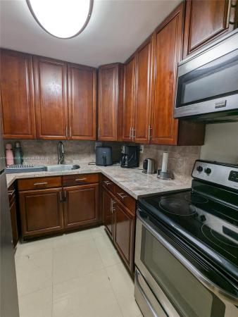 St Andrews Court, 1555 W 44th Pl #207, Hialeah, Florida 33012, image 1