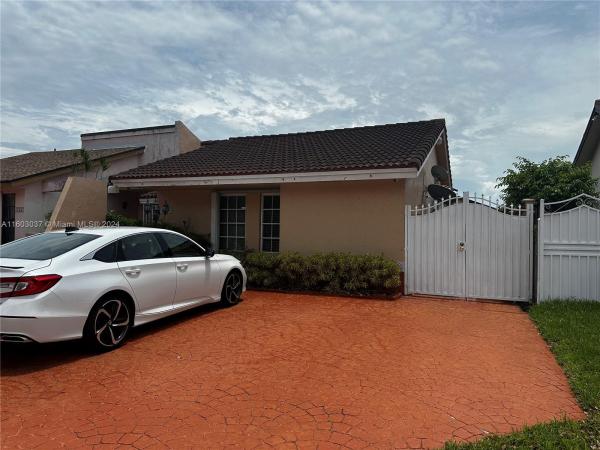 Golden Twin Homes At International Gardens, 12334 SW 10th St, Tamiami, Florida 33184, image 1