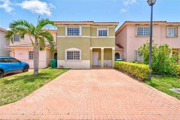 Precious Homes At Twin Lakes, 14323 SW 134th Ct 0, Three Lakes, Florida 33186, image 2