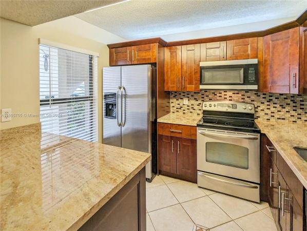 Quatraine At Jacaranda Gardens, 9811 NW 3rd Ct #7, Fort Lauderdale, Florida 33324, image 1