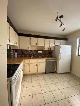 Villas At Carriage Hills Lakeside, 275 Gate Rd #214, Hollywood, Florida 33024, image 1