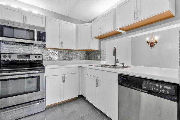 Pine Ridge North 3, 728 Sunny Pine Way #E2, Greenacres, Florida 33415, image 1