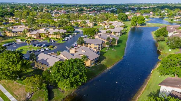 Azalea Court At Woodmont, 8780 Azalea Ct #104, Tamarac, Florida 33321, image 1