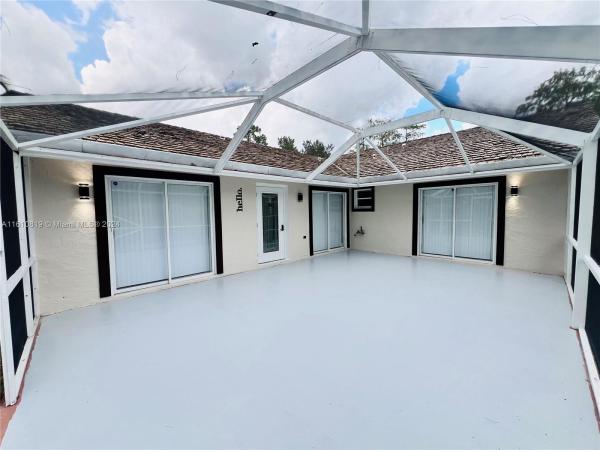Sugar Pond Manor, 1329 Periwinkle Pl, Wellington, Florida 33414, image 2