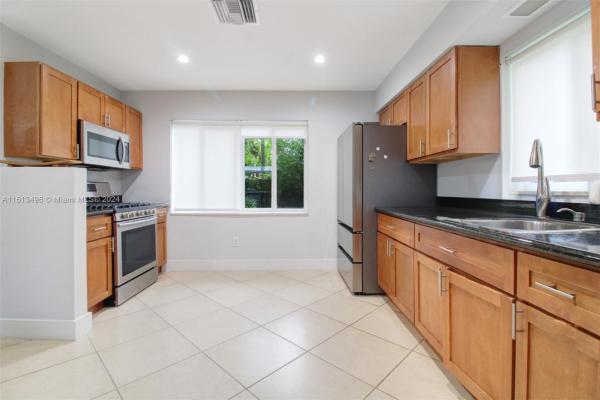 Heftler Homes Sunset Park, 9730 SW 76th St, Sunset, Florida 33173, image 3