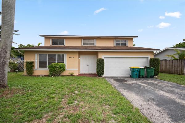 Woodland Greens, 5620 NW 57th Way, Tamarac, Florida 33319, image 1