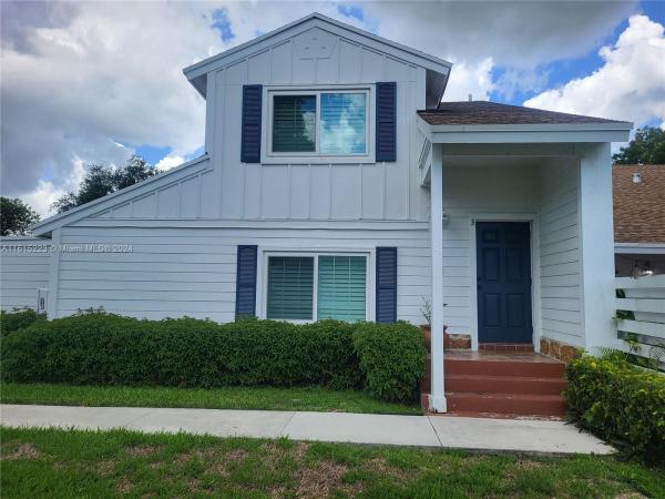 Village Homes At Country Walk, 13724 SW 149th Cir Ln #3, Country Walk, Florida 33186, image 1