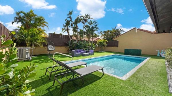 California Club Homes, 1040 NE 204th Ter, Ives Estates, Florida 33179, image 1