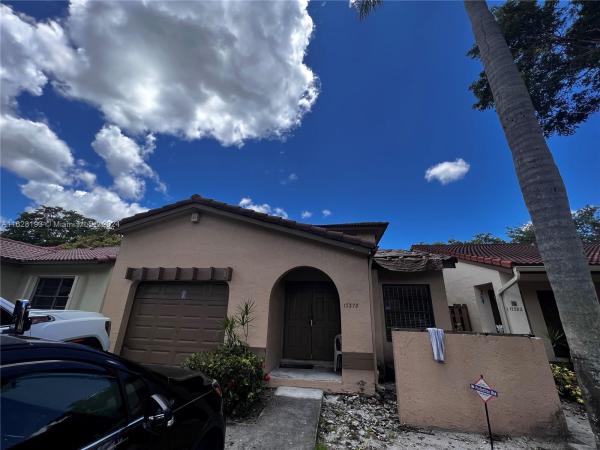 The Moors Townhouses, 17378 NW 66th Pl, Hialeah, Florida 33015, image 1