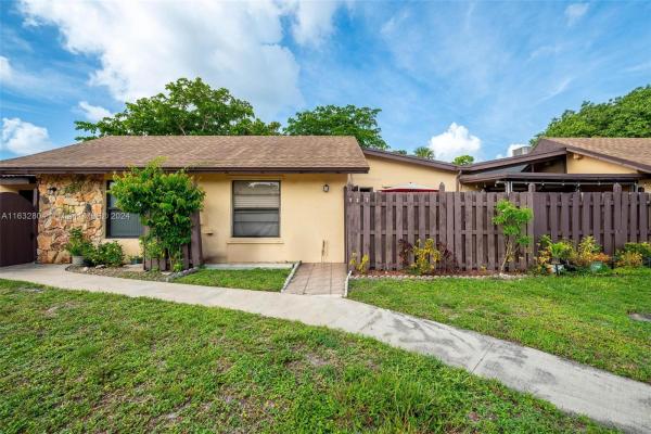 Villas At Carriage Hills Lakeside, 127 Gate Rd #2-65, Hollywood, Florida 33024, image 1