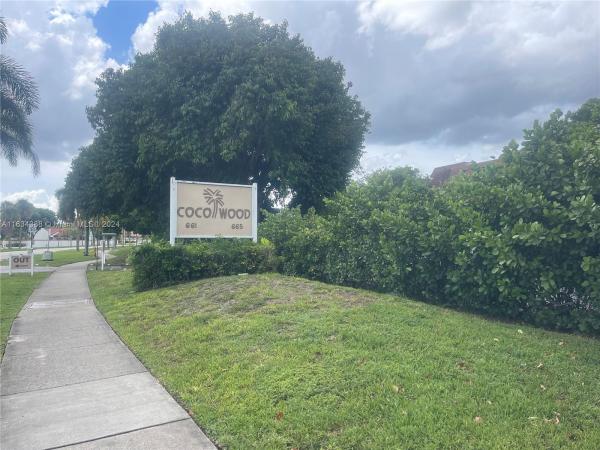 Coco Wood, 661 NE 195th St #309, Ives Estates, Florida 33179, image 1